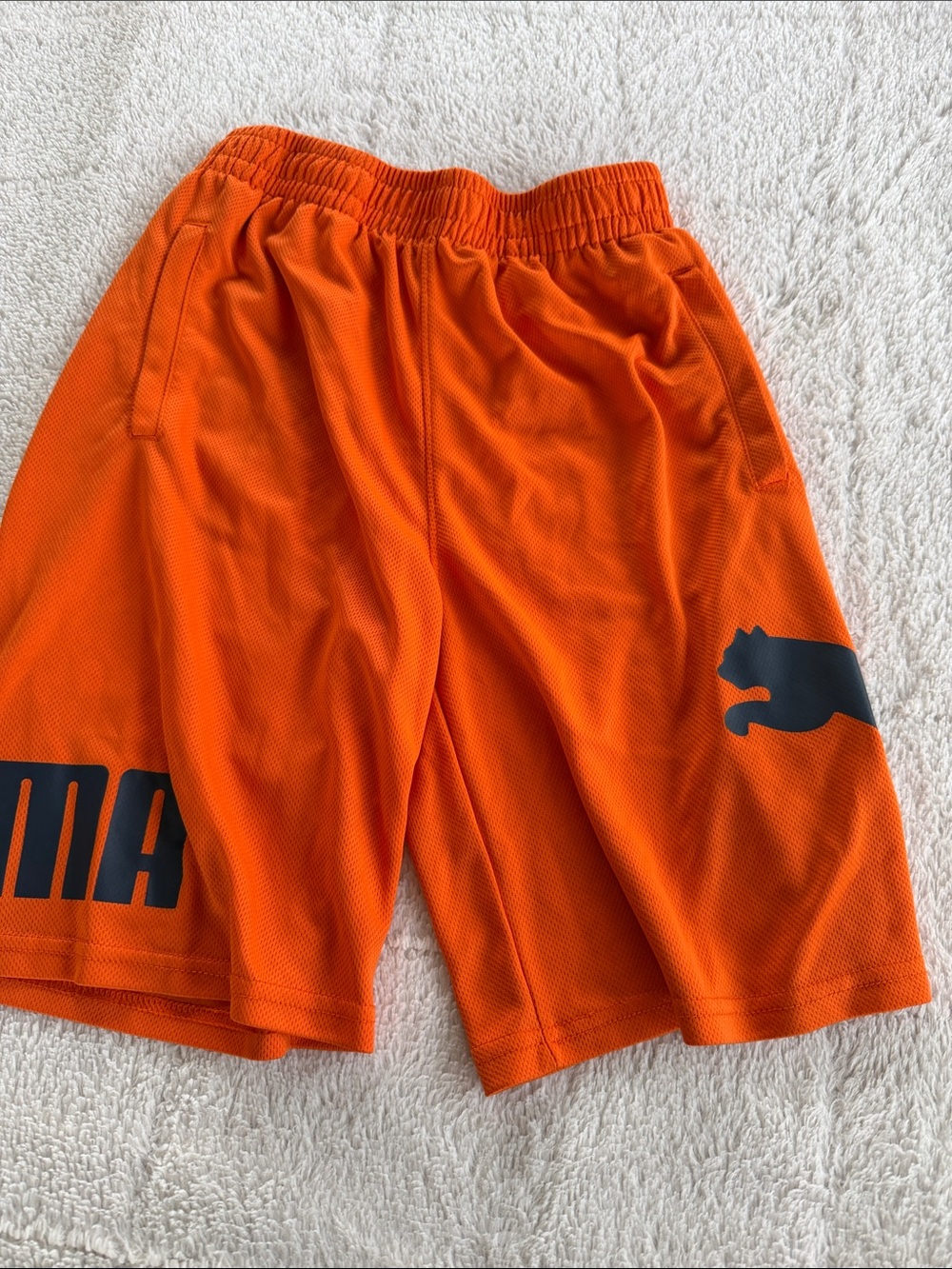 Puma Men’s Bright Orange Athletic Mesh Shorts with Black Logo
